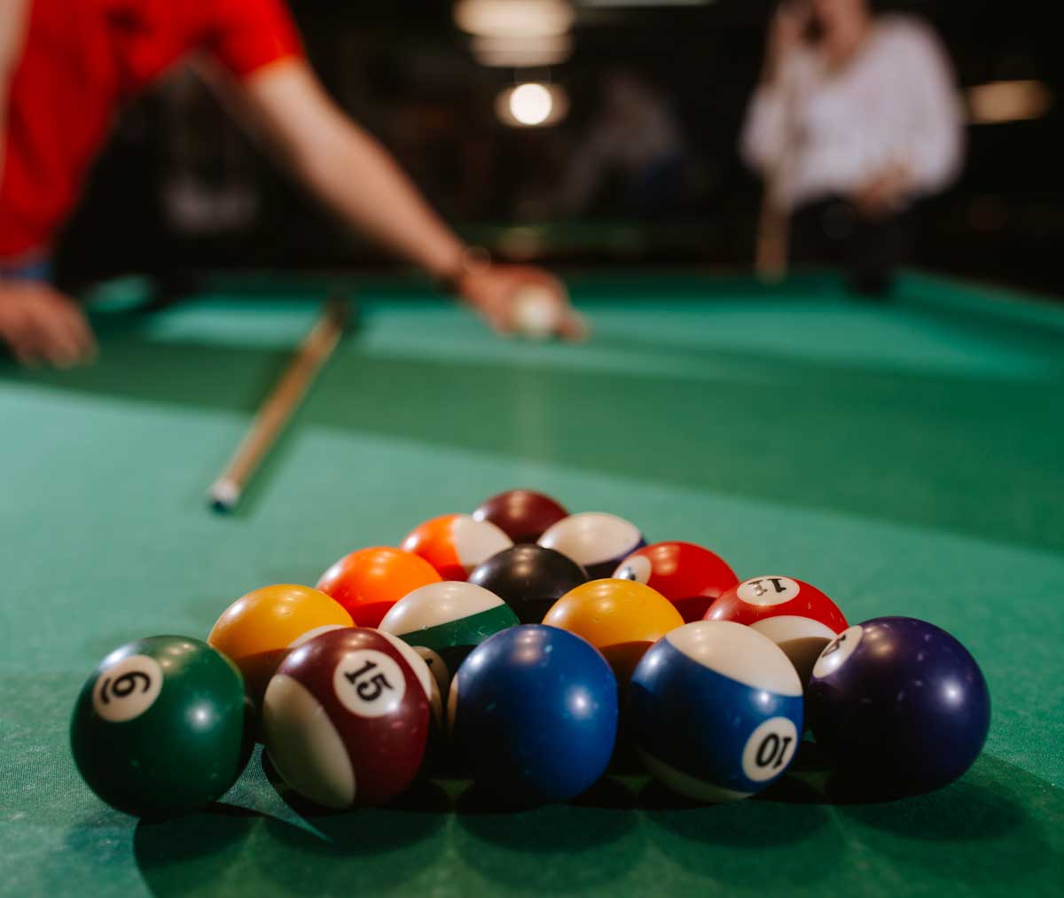 pool table with players
